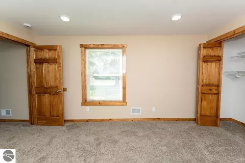 Bedroom - 216 W Fifth St, Clare, MI 48617 photo 1 of 6