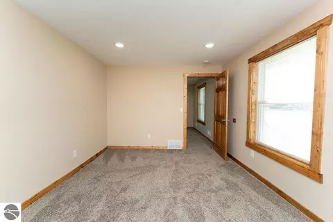 Bedroom - 216 W Fifth St, Clare, MI 48617 photo 2 of 6