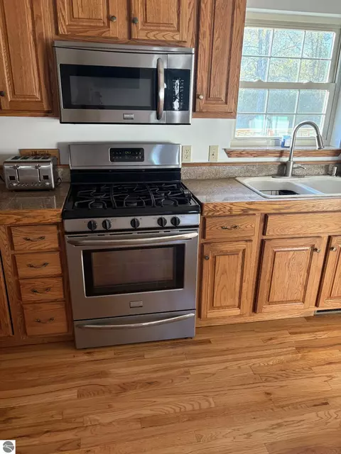 Kitchen - 99 N Alamando Rd, Shepherd, MI 48883 photo 3 of 5