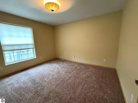 Bedroom - 103 Ultra Ct, Roscommon, MI 48653 photo 2 of 4