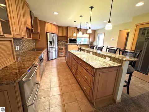 Kitchen - 103 Ultra Ct, Roscommon, MI 48653 photo 1 of 8