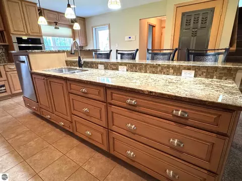 Kitchen - 103 Ultra Ct, Roscommon, MI 48653 photo 7 of 8