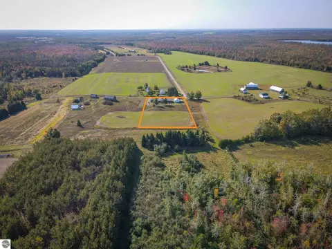 7557 Loop Rd, Posen, MI 49776