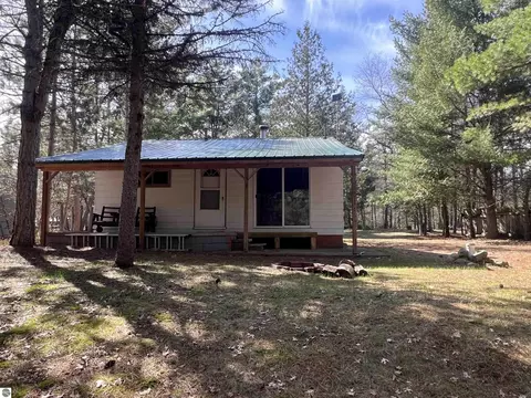 9769 Parrot Cir, Fife Lake, MI 49633