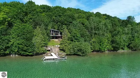 7681 NW Torch Lake Dr, Kewadin, MI 49648