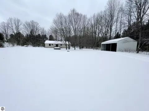 10511 NE Lake Of The Woods, Mancelona, MI 49659