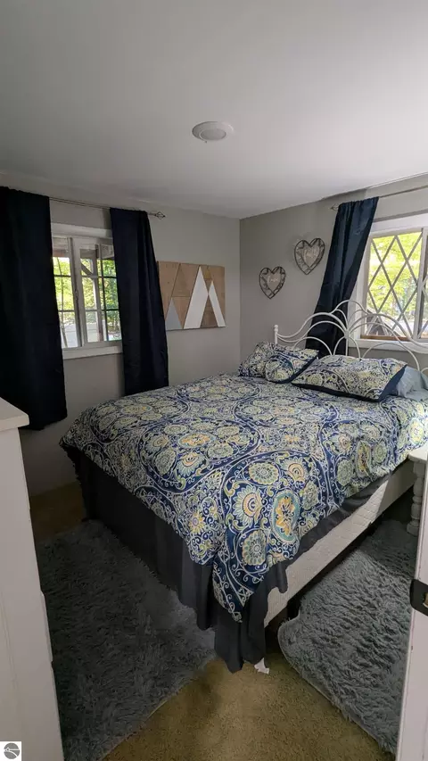 Bedroom - 2552 E Birch Ct, Cedar, MI 49621 photo 10 of 13