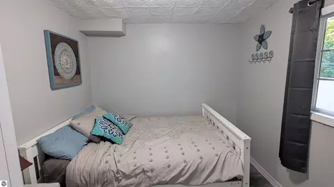 Bedroom - 2552 E Birch Ct, Cedar, MI 49621 photo 12 of 13