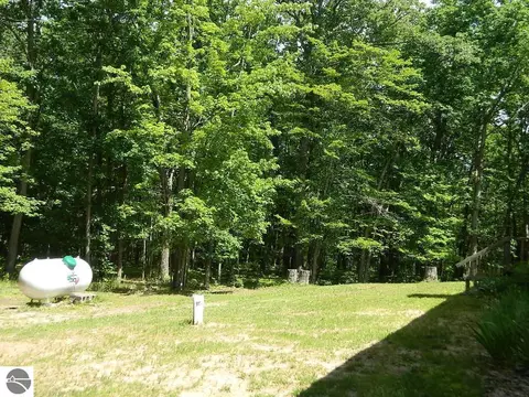 Exterior - 5651 E Haskell Lake Rd, Harrison, MI 48625 photo 1 of 13