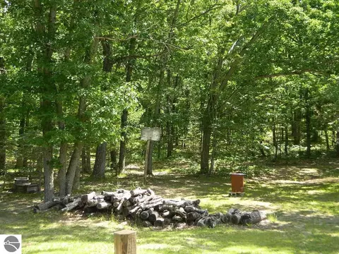 Exterior - 5651 E Haskell Lake Rd, Harrison, MI 48625 photo 2 of 13