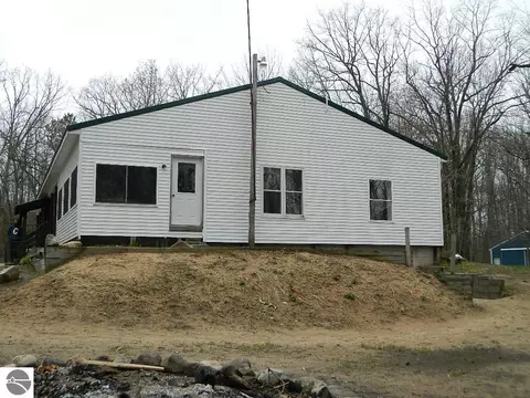 Exterior - 5651 E Haskell Lake Rd, Harrison, MI 48625 photo 3 of 13