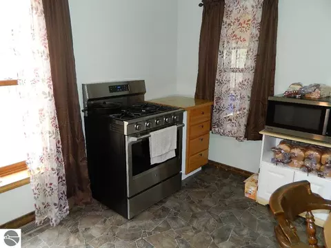 Kitchen - 5651 E Haskell Lake Rd, Harrison, MI 48625 photo 3 of 5