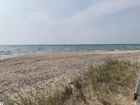 410 Golden Beach Dr, Kewadin, MI 49648