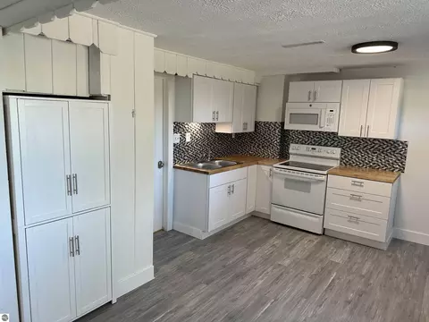 Kitchen - 7075 E M 72, Williamsburg, MI 49690 photo 2 of 2
