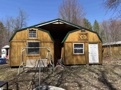 6477 Hill Crest Dr, Elmira, MI 49730