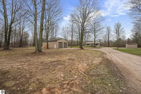 Exterior - 11337 Riley Rd, Interlochen, MI 49643 photo 4 of 7