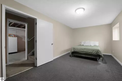 Bedroom - 11337 Riley Rd, Interlochen, MI 49643 photo 6 of 6