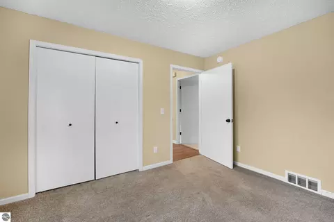 Bedroom - 11337 Riley Rd, Interlochen, MI 49643 photo 4 of 6