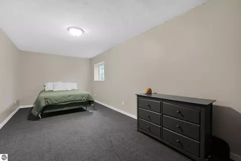 Bedroom - 11337 Riley Rd, Interlochen, MI 49643 photo 5 of 6