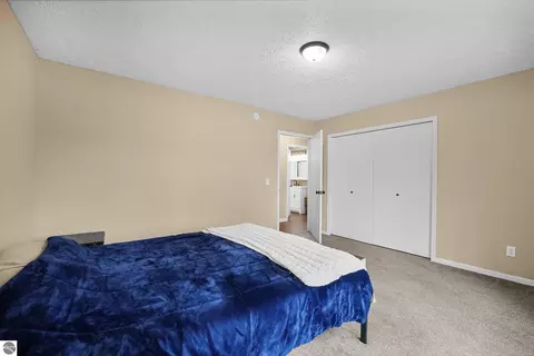 Bedroom - 11337 Riley Rd, Interlochen, MI 49643 photo 2 of 6