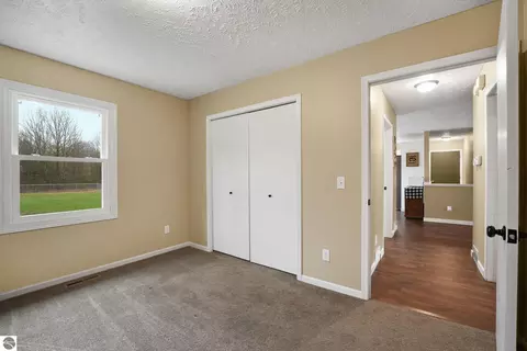 Bedroom - 11337 Riley Rd, Interlochen, MI 49643 photo 3 of 6