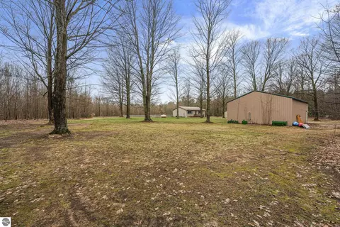 Exterior - 11337 Riley Rd, Interlochen, MI 49643 photo 5 of 7