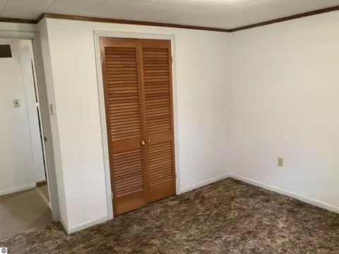 Bedroom - 5240 Sumac Trl, Lupton, MI 48635 photo 2 of 3