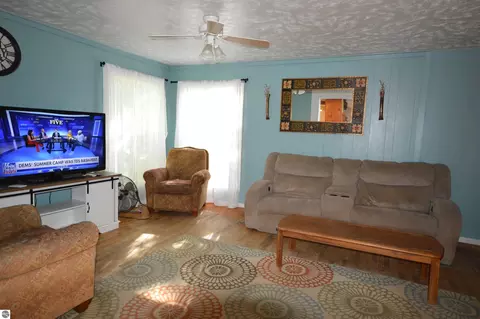 Living - 6830 Youker Rd, Grawn, MI 49637 photo 1 of 2