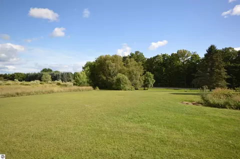 Exterior - 6830 Youker Rd, Grawn, MI 49637 photo 15 of 20