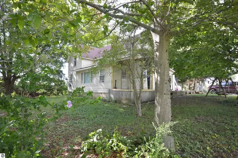 Exterior - 6830 Youker Rd, Grawn, MI 49637 photo 7 of 20