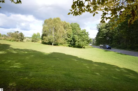 Exterior - 6830 Youker Rd, Grawn, MI 49637 photo 5 of 20