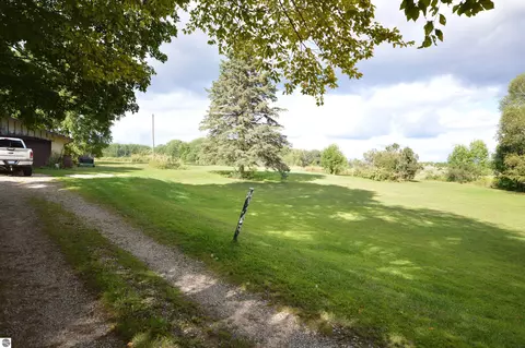 Exterior - 6830 Youker Rd, Grawn, MI 49637 photo 2 of 20