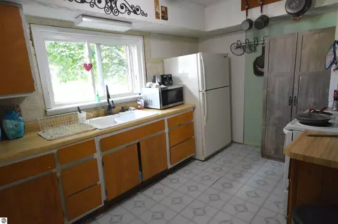 Kitchen - 6830 Youker Rd, Grawn, MI 49637 photo 1 of 1