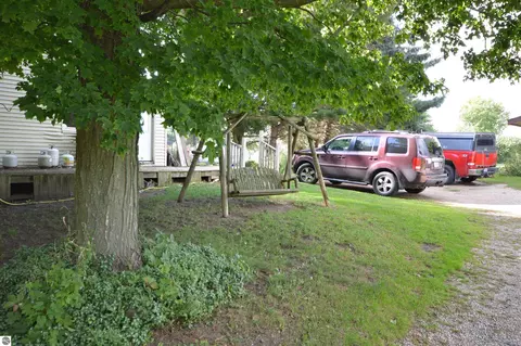 Exterior - 6830 Youker Rd, Grawn, MI 49637 photo 4 of 20