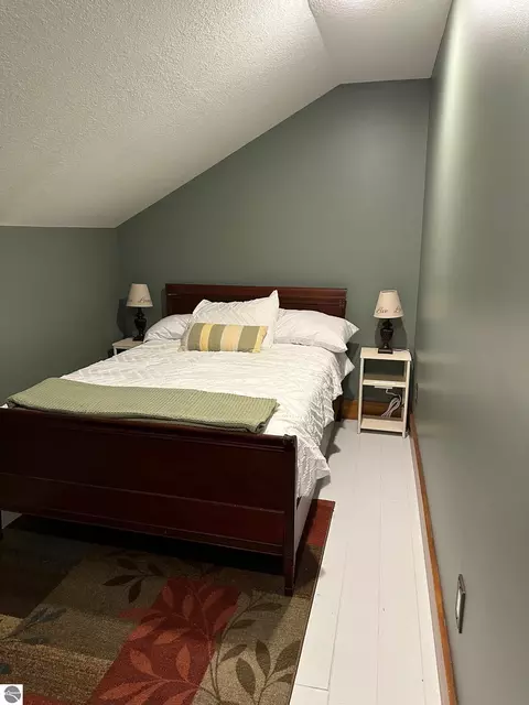 Bedroom - 323 W Wright Ave, Shepherd, MI 48883 photo 2 of 3