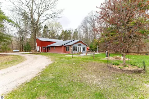 Exterior - 20802 E Trails End Trl, Interlochen, MI 49643 photo 5 of 8