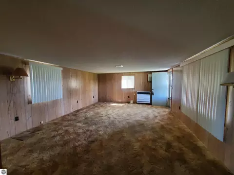 Living - 2890 Twin Lake Rd, Lupton, MI 48635 photo 1 of 2