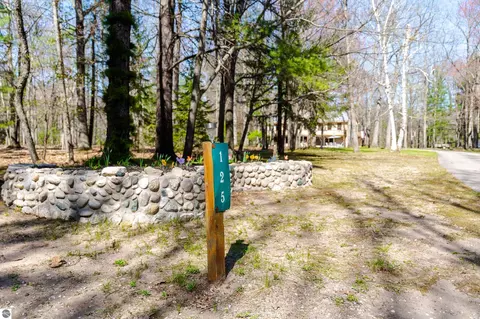 Exterior - 125 Dubonnet Trl, Interlochen, MI 49643 photo 3 of 27