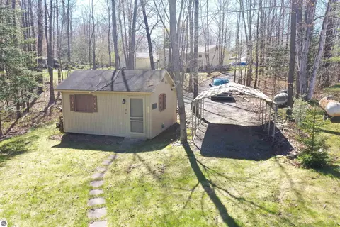 Exterior - 4874 Channel Dr, Lupton, MI 48635 photo 4 of 8