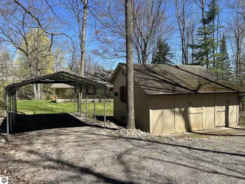 Exterior - 4874 Channel Dr, Lupton, MI 48635 photo 3 of 8