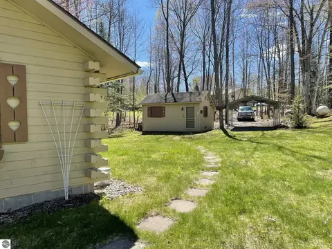 Exterior - 4874 Channel Dr, Lupton, MI 48635 photo 2 of 8