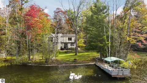 10176 Harmony Dr, Interlochen, MI 49643