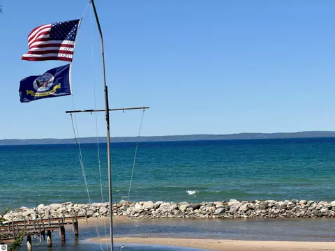 724 S Golden Beach Dr, Kewadin, MI 49648