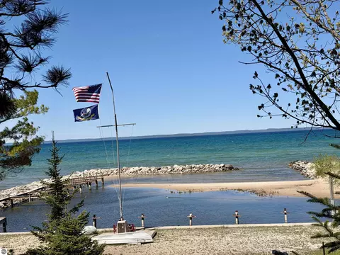 724 S Golden Beach Dr, Kewadin, MI 49648
