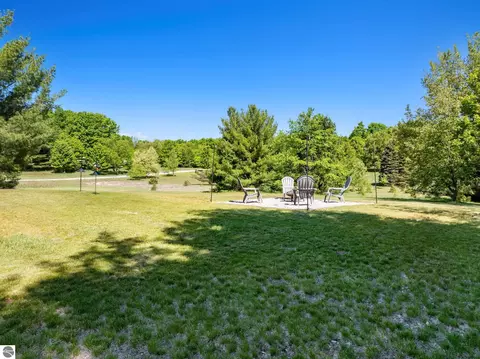 Exterior - 18880 Lance Ln, Interlochen, MI 49643 photo 9 of 14