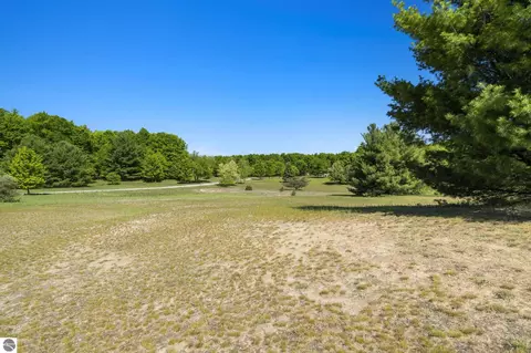 Exterior - 18880 Lance Ln, Interlochen, MI 49643 photo 12 of 14