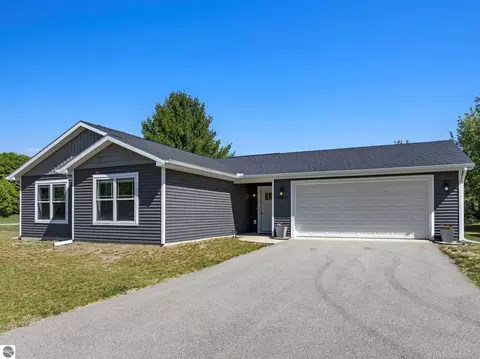 Exterior - 18880 Lance Ln, Interlochen, MI 49643 photo 4 of 14