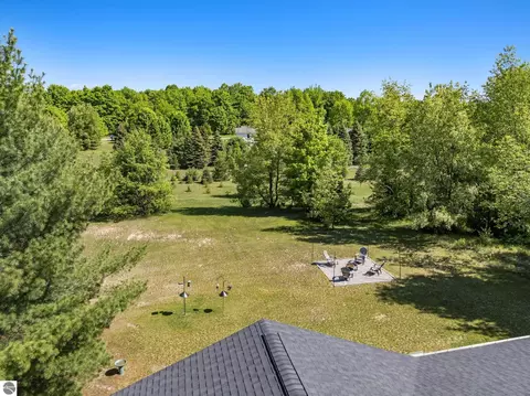 Exterior - 18880 Lance Ln, Interlochen, MI 49643 photo 10 of 14