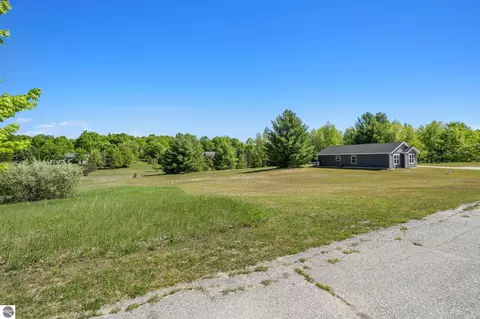 Exterior - 18880 Lance Ln, Interlochen, MI 49643 photo 13 of 14