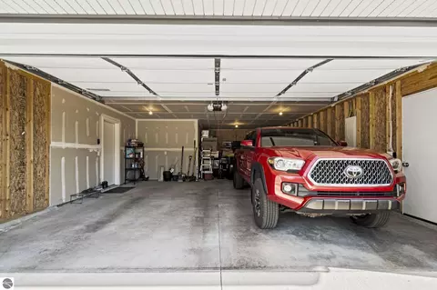 Exterior - 18880 Lance Ln, Interlochen, MI 49643 photo 5 of 14